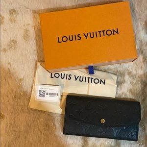 Louis Vuitton Empreinte Leather Emilie Wallet.